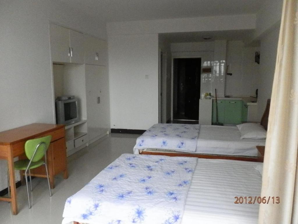 Xingfu Hotel 난닝 시 객실 사진